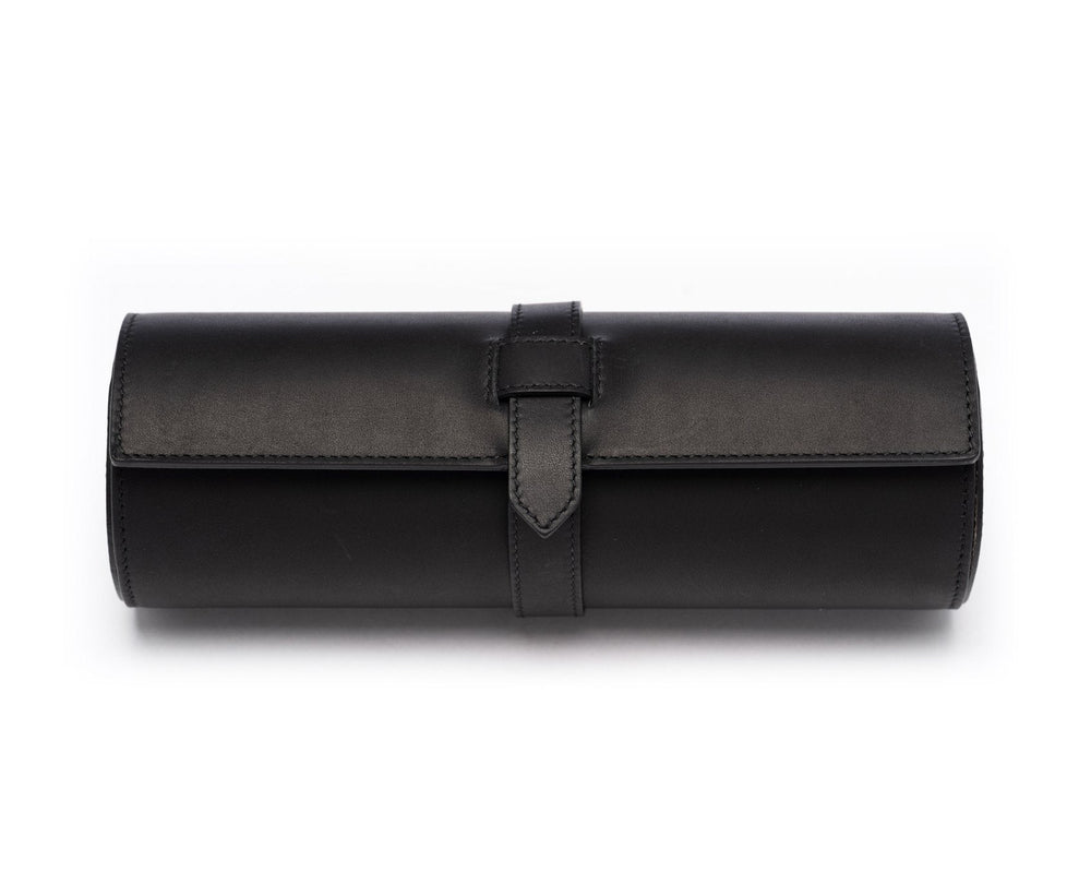 Front view of Watch Roll No. 504 in black leather with tab fastening and cylindrical roll on white background