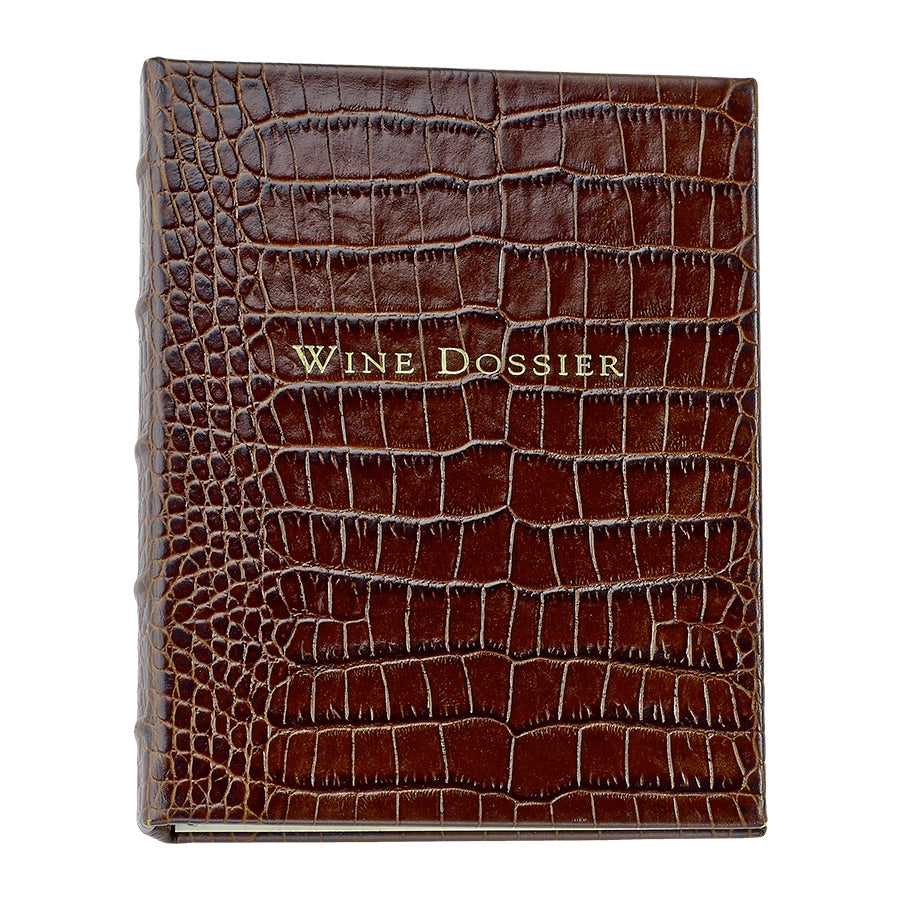 Front view of the Wine Dossier in brown crocodile embossed leather showcasing its textured cover on a white background