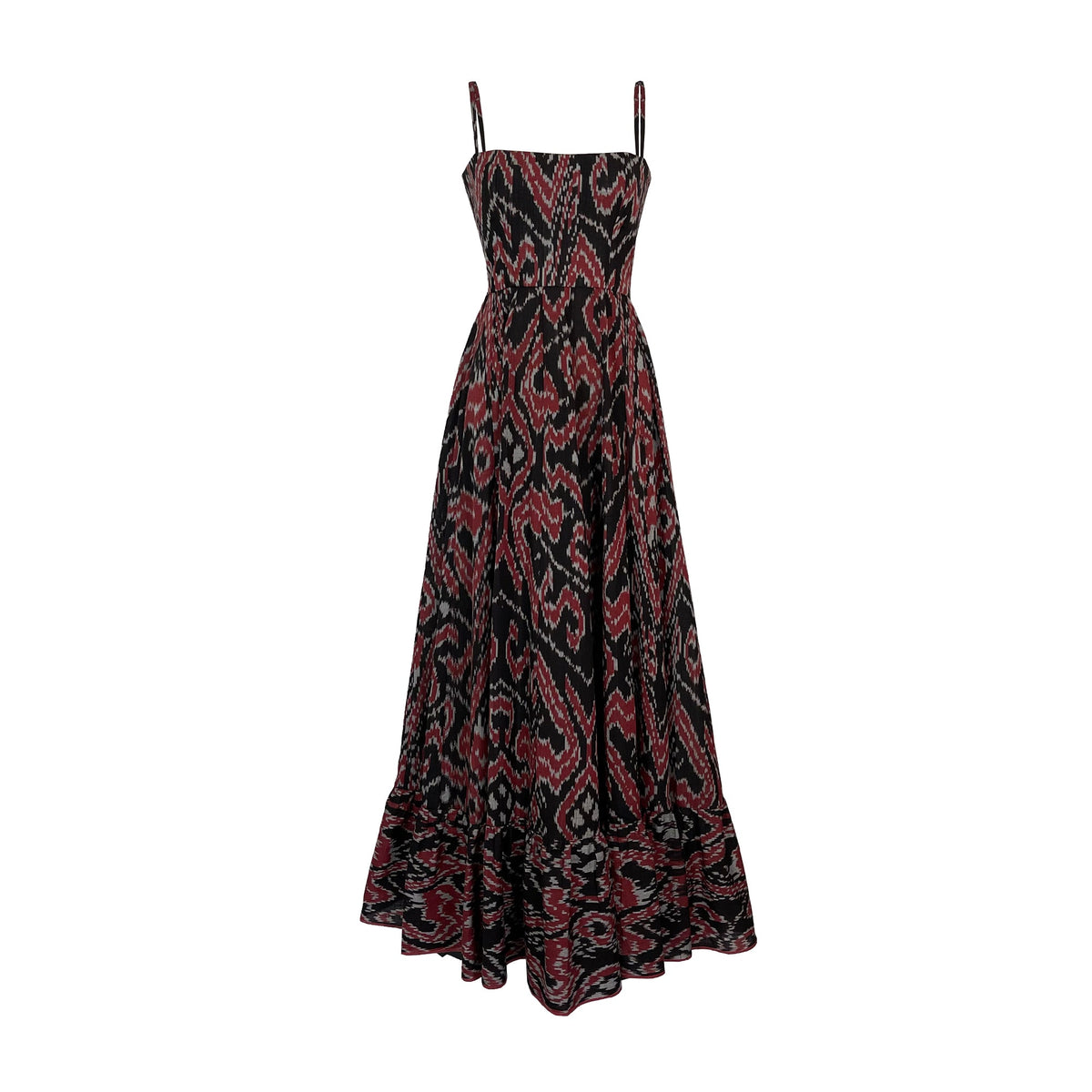 Front view of Aries Dress with cinched waist, corset bodice, shoulder straps, and black, red, and grey ikat pattern on white background