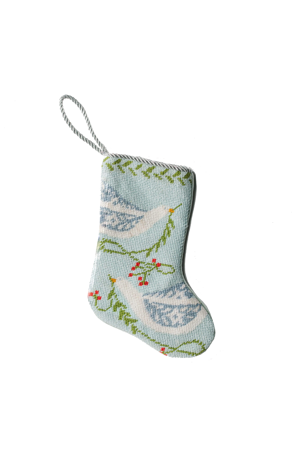 Angled view of blue Peace on Earth Bauble Stocking showcasing a needlepoint dove and braided hanging loop on white background