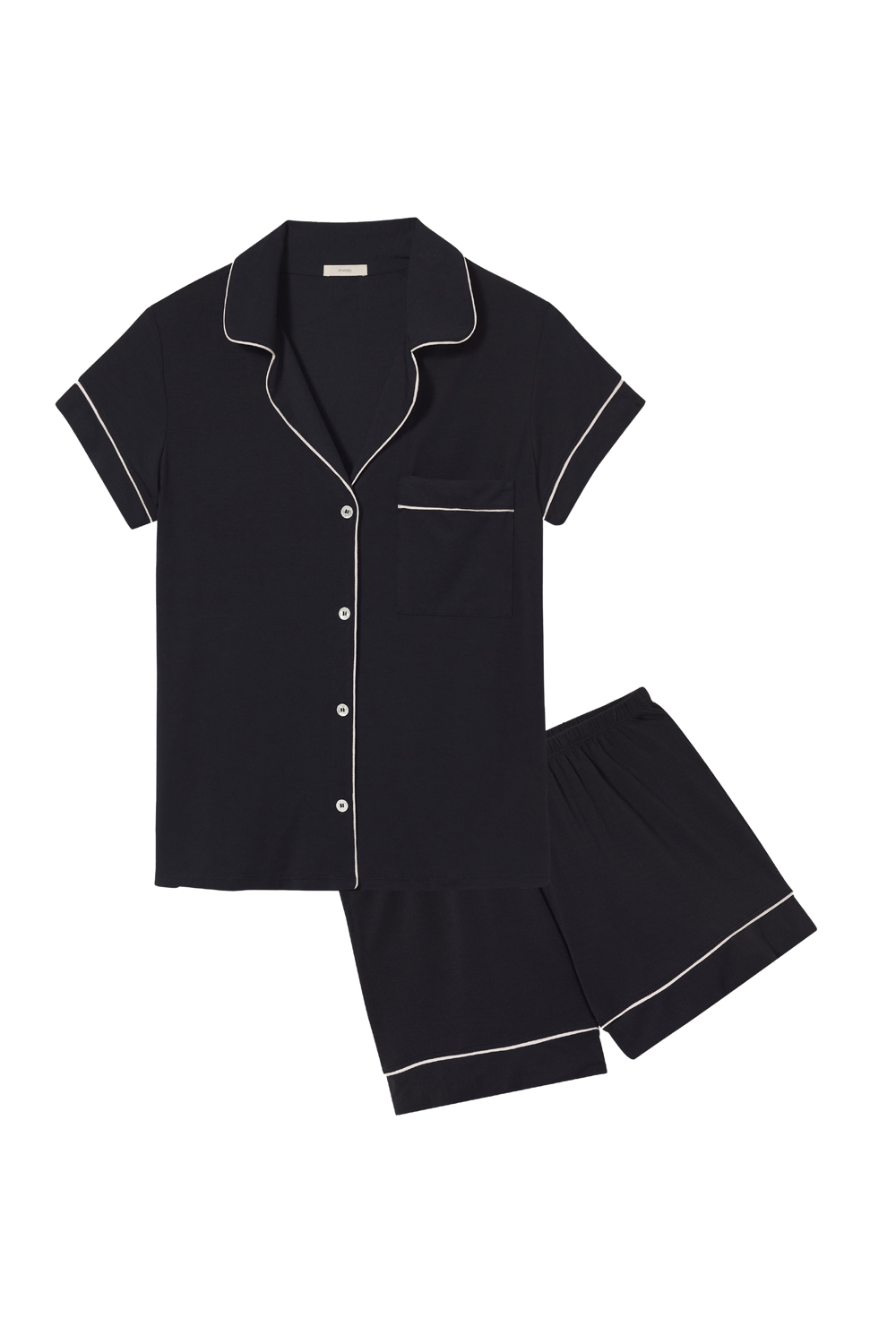 Flat lay of black Gisele Shortie PJ set with white piped trim, button-front short-sleeve top and matching shorts