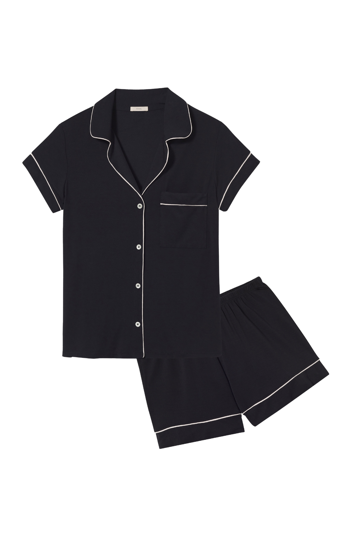 Flat lay of black Gisele Shortie PJ set with white piped trim, button-front short-sleeve top and matching shorts