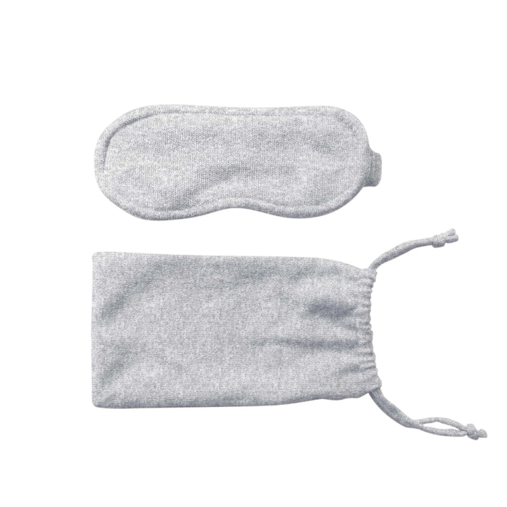 Top down view of smoke cashmere Custom Initials eyemask with matching drawstring pouch on white background