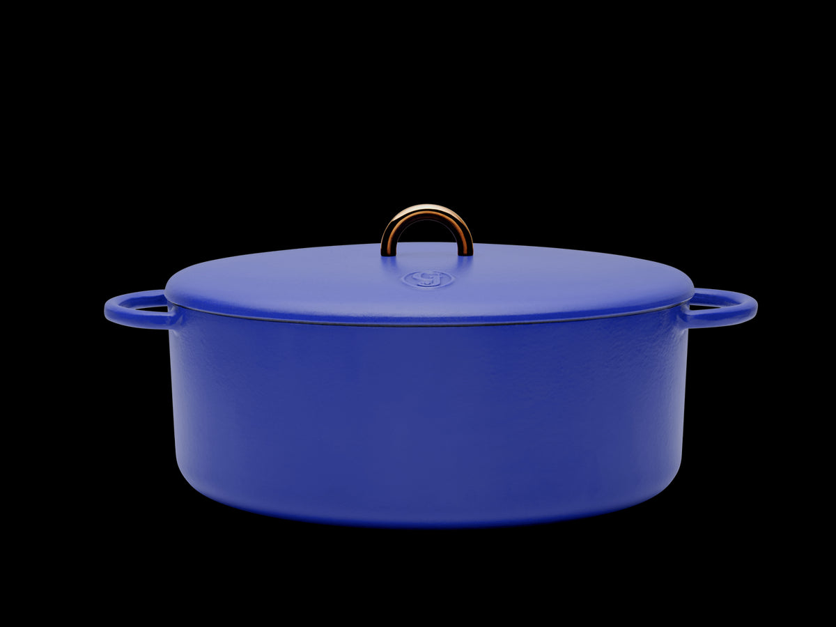 Enameled cast-iron Dutch oven in blueberry blue - side view with lid