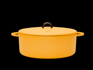 Enameled cast-iron Dutch oven in mustard yellow - side view with lid
