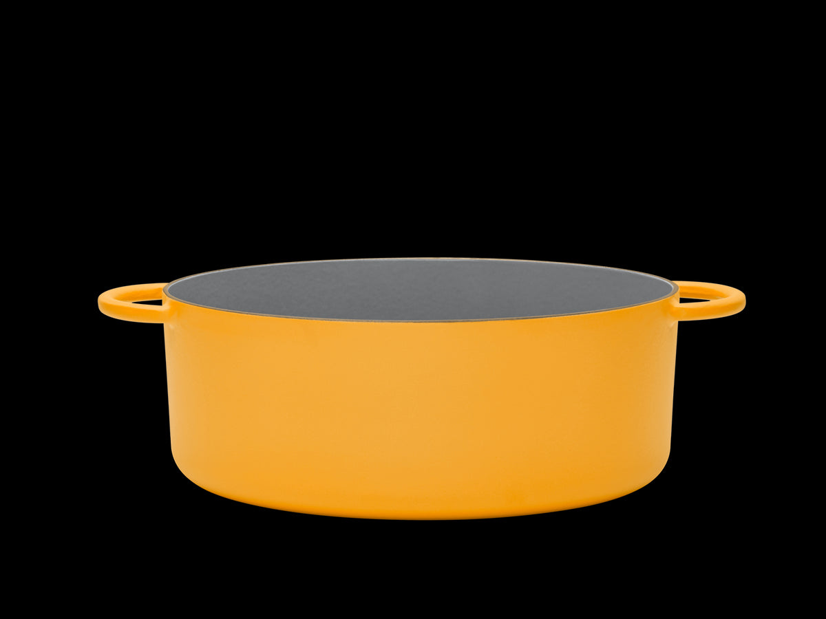 Enameled cast-iron Dutch oven in mustard yellow - side view no lid