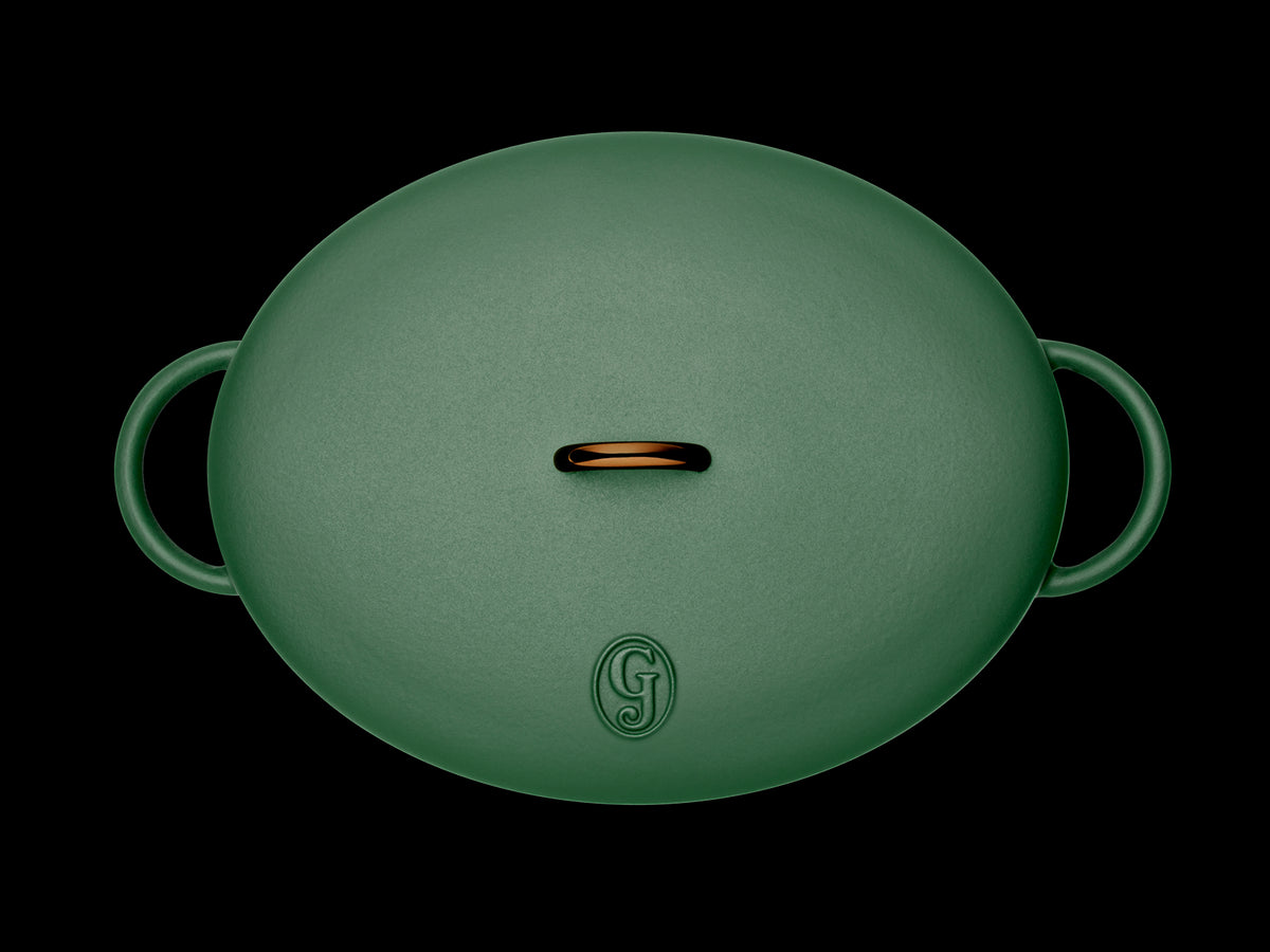 Enameled cast-iron Dutch oven in broccoli green - top down view with lid