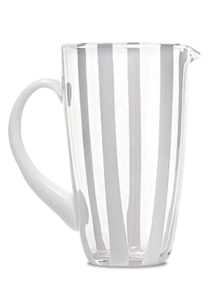 Front view of Gessato Carafe showcasing transparent glass and curved vertical stripes with a white background