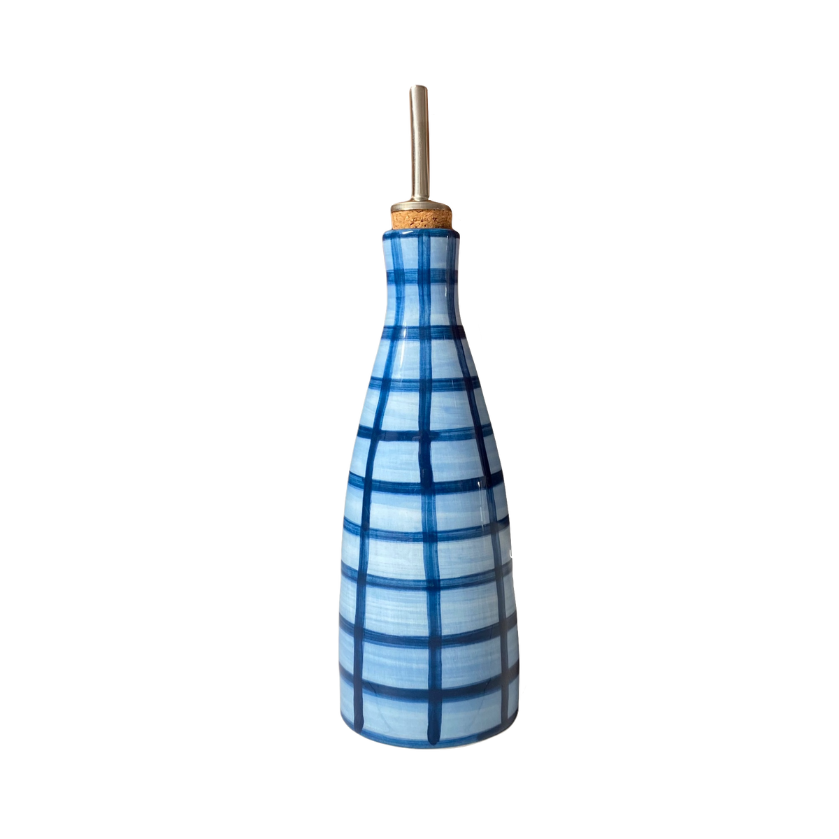 Front view of Oily Baby Gingham oil dispenser, blue hand-painted gingham ceramic body with cork stopper and metal pour spout on white background