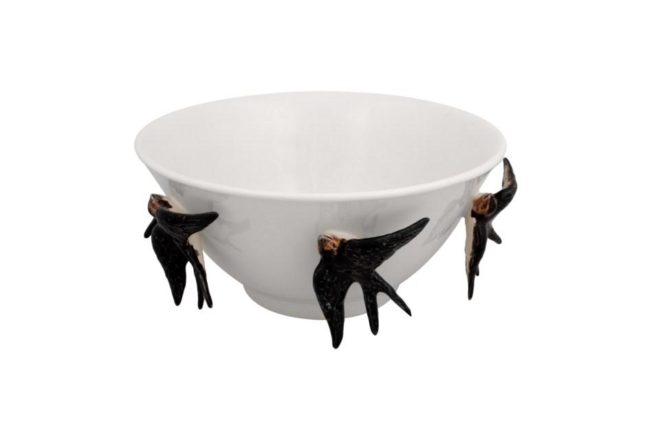 Front view of Arte Bordallo tall white earthenware bowl with three sculpted swallows attached to the rim on white background