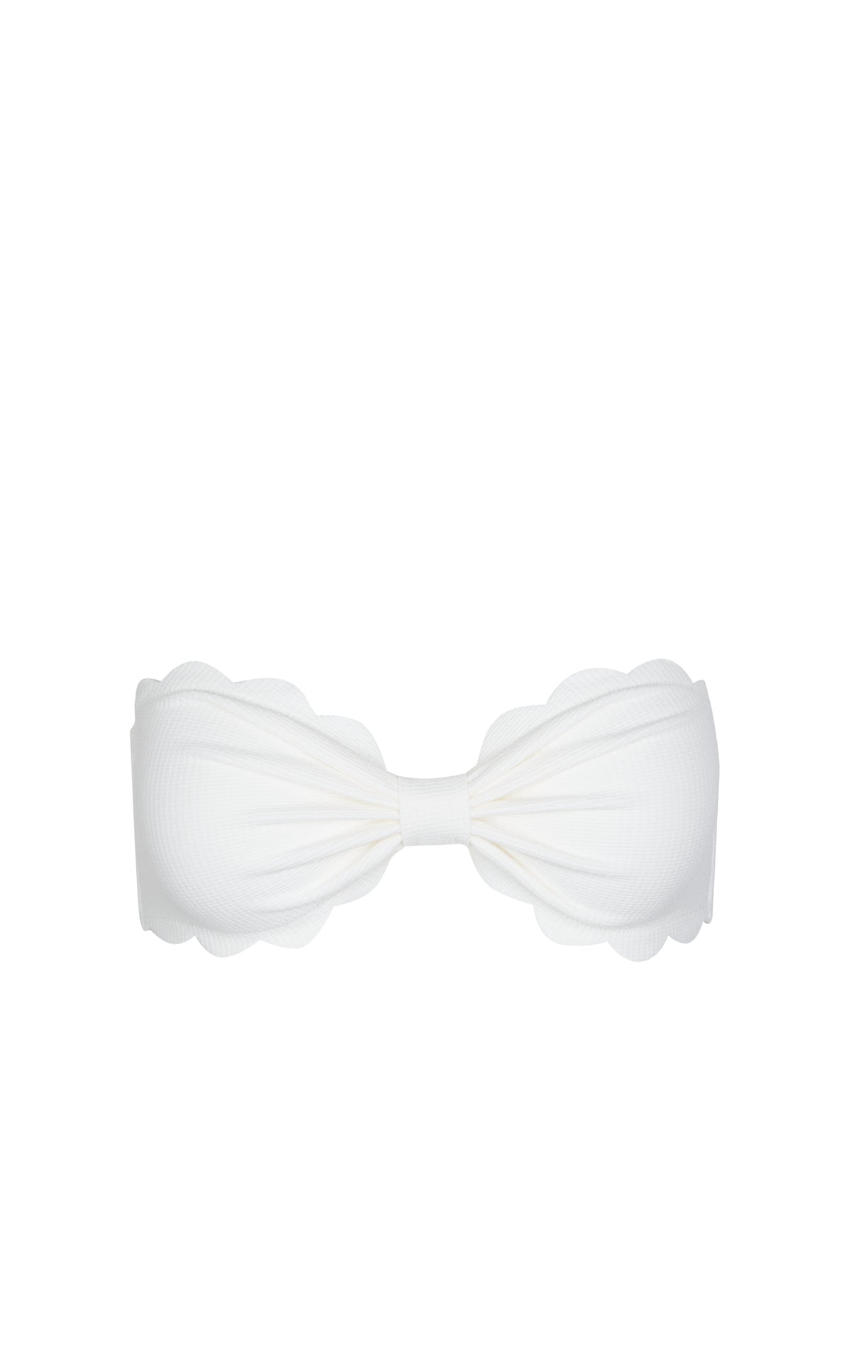 Front view of white Antibes Top showcasing scalloped edges and a pleated center on a white background