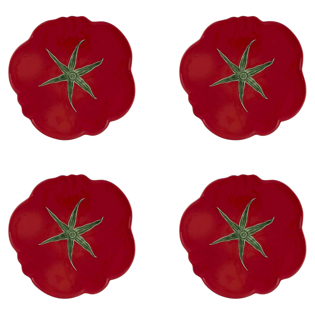 Top view of four tomato-shaped pizza plates showcasing red earthenware and green stem designs on a white background