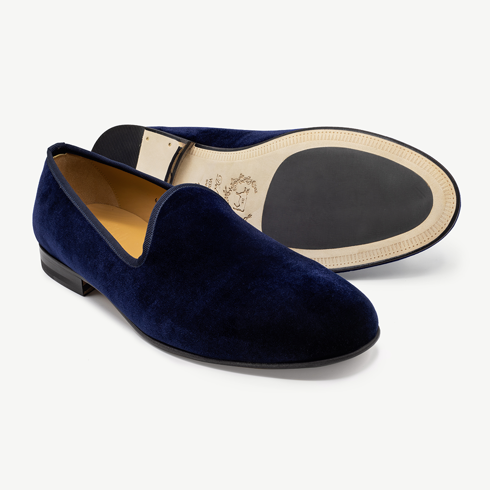 Three-quarter view of Men’s Navy Velvet Slipper II showcasing its navy velvet exterior on a white background