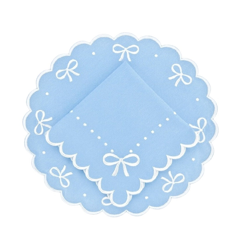 Embroidered blue placemat with white bows, embroidered placemat  and matching napkin