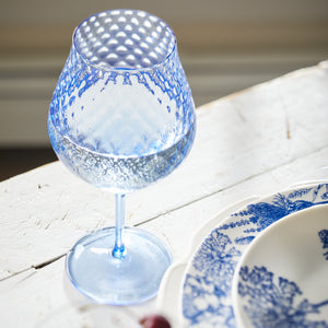 Phoebe cobalt blue mouth blown diamond optic crystal universal wine glass from Caskata.