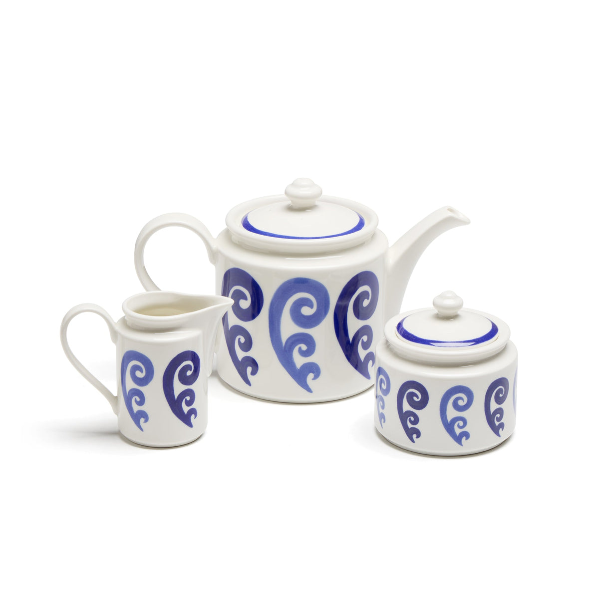 Front view of Athenee Peacock Two Tone Blue Tea Set with blue hand-painted scrollwork on white porcelain