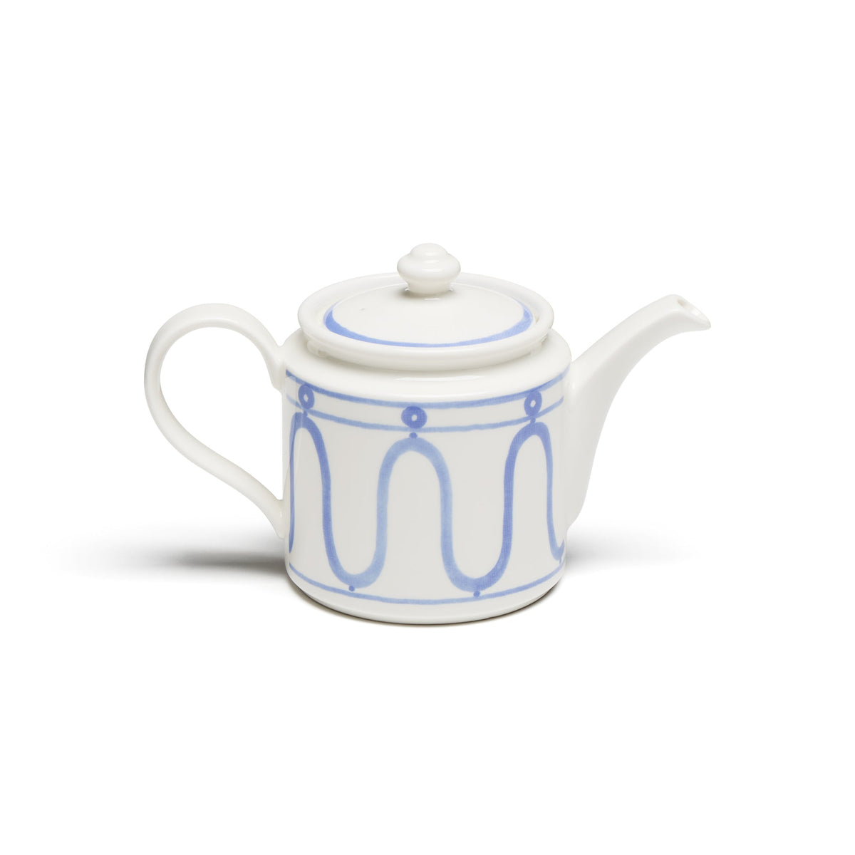 Front view of The Serenity Blue Tea Set showcasing its blue geometric porcelain teapot with a white background