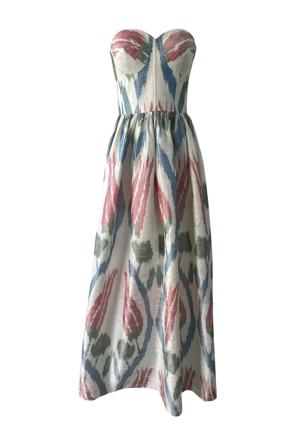 Front view of Tulip Dress with strapless sweetheart bodice, cinched waist and full skirt in red, blue and green ikat