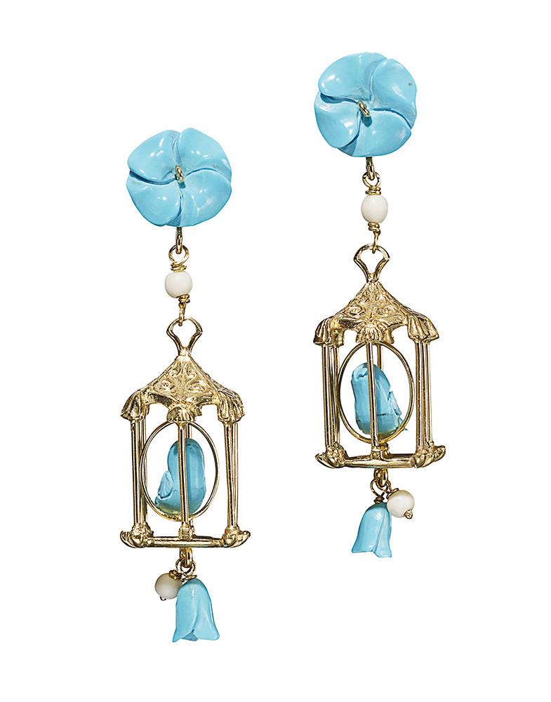 Front view of pair of Pagoda earrings showcasing gold birdcage design, turquoise beads, and white agate on white background