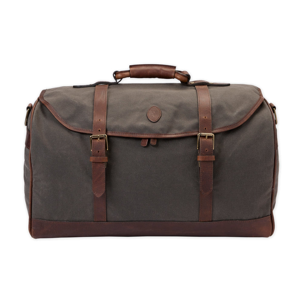 Front-facing Canvas Weekender Duffel Bag in bark canvas with full-grain leather straps and brass buckles on white background